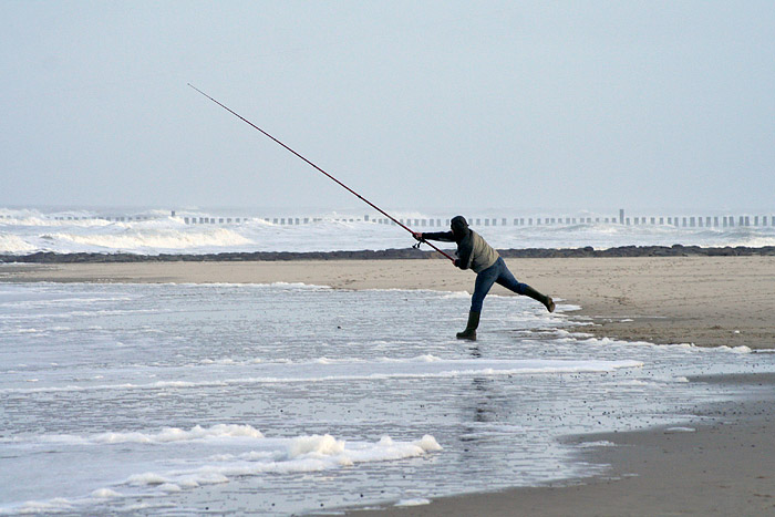 Angler am Strand